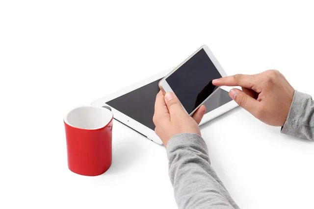business, tea cup, cabin, cup, desk, coffee, calculator, mobile, phone, tablet, holding, technology, businessman, hand, human, work, tea, smartphone, wireless, touchscreen, coffee cup, touch, message, social media, internet, working. Customer success software costs and pricing explained for UK teams